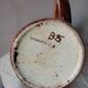 Earthenware decanter in false wood