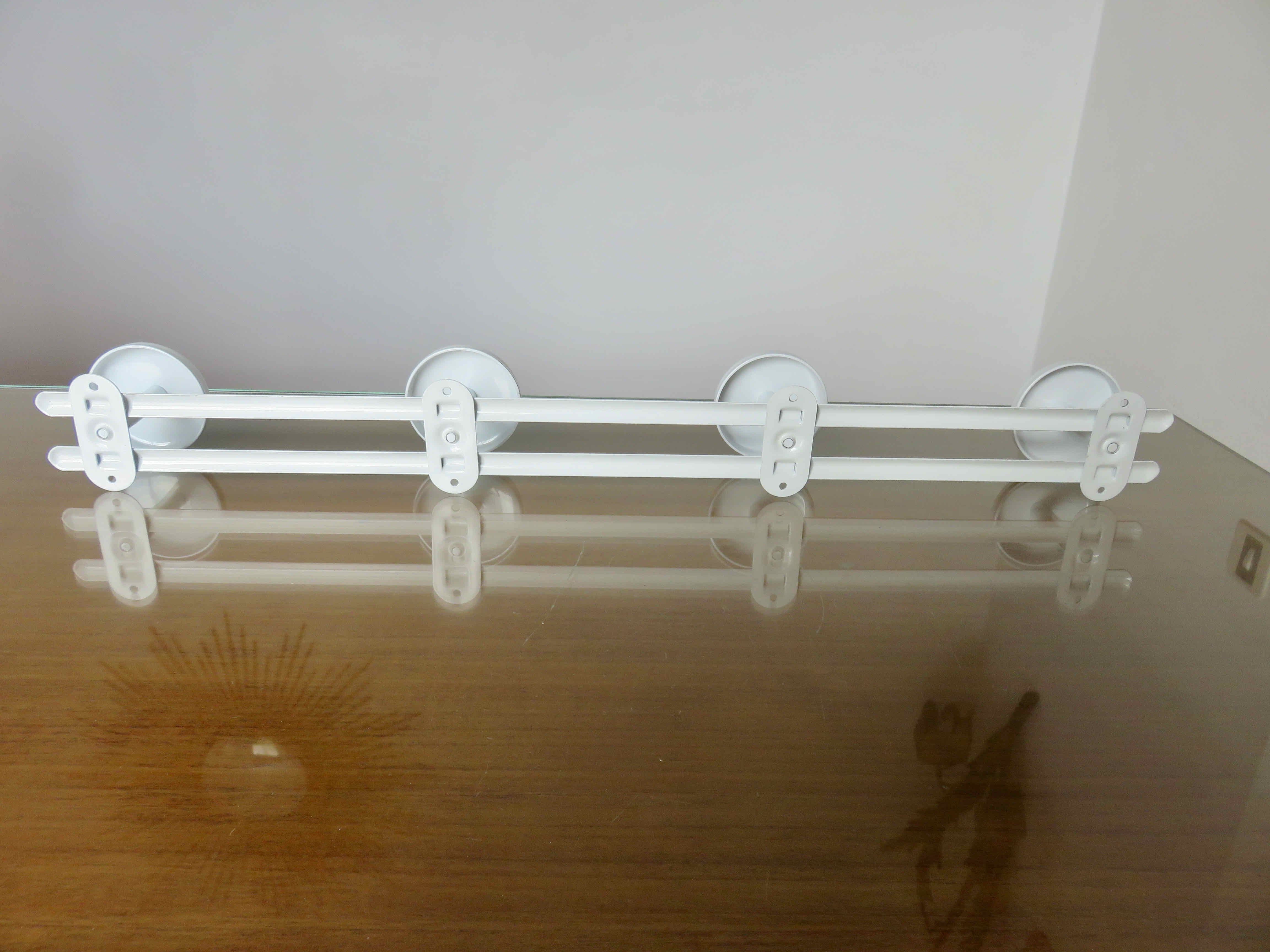Coat rack in white lacquered metal 70s