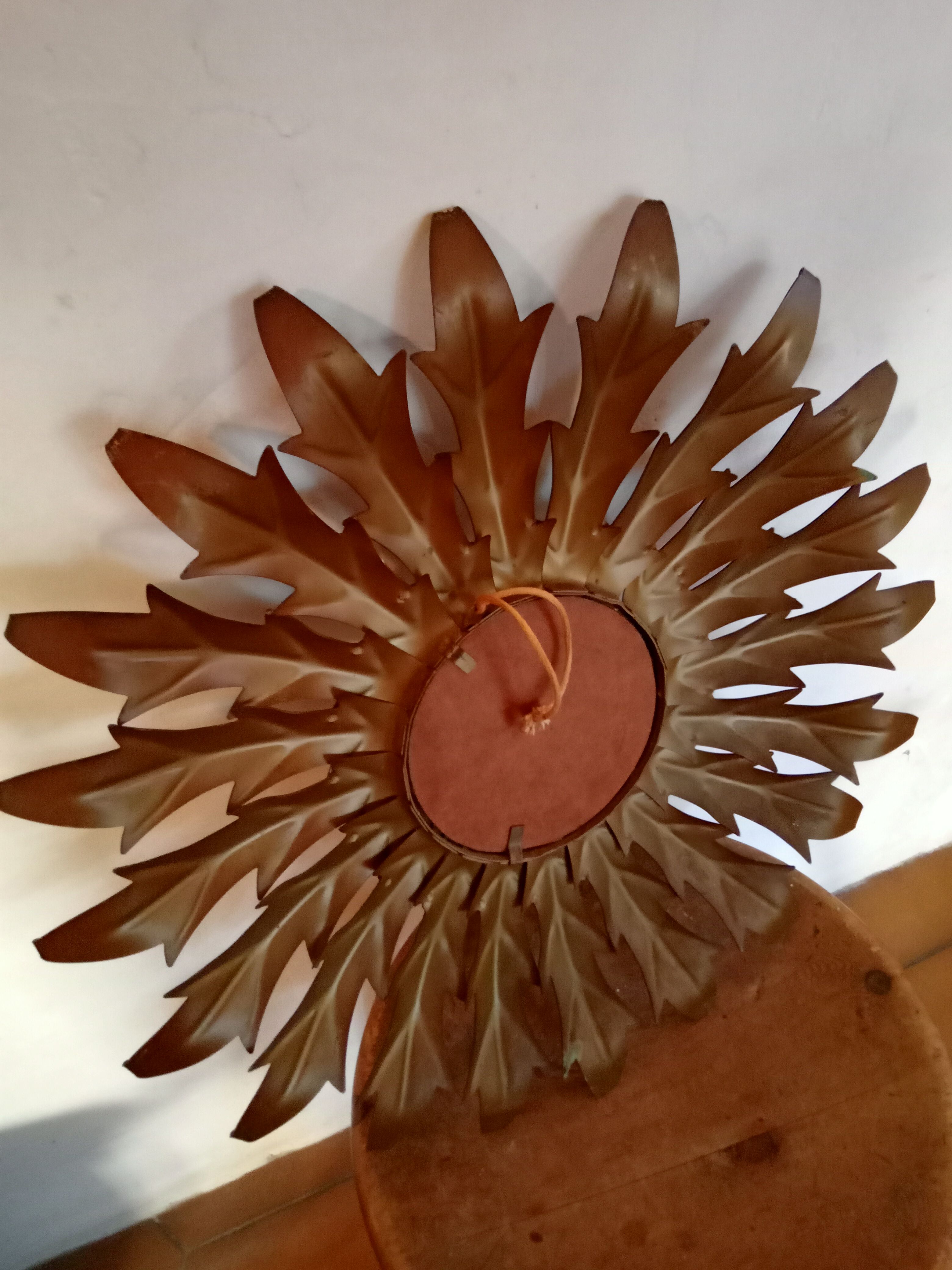 Vintage metal sun mirror