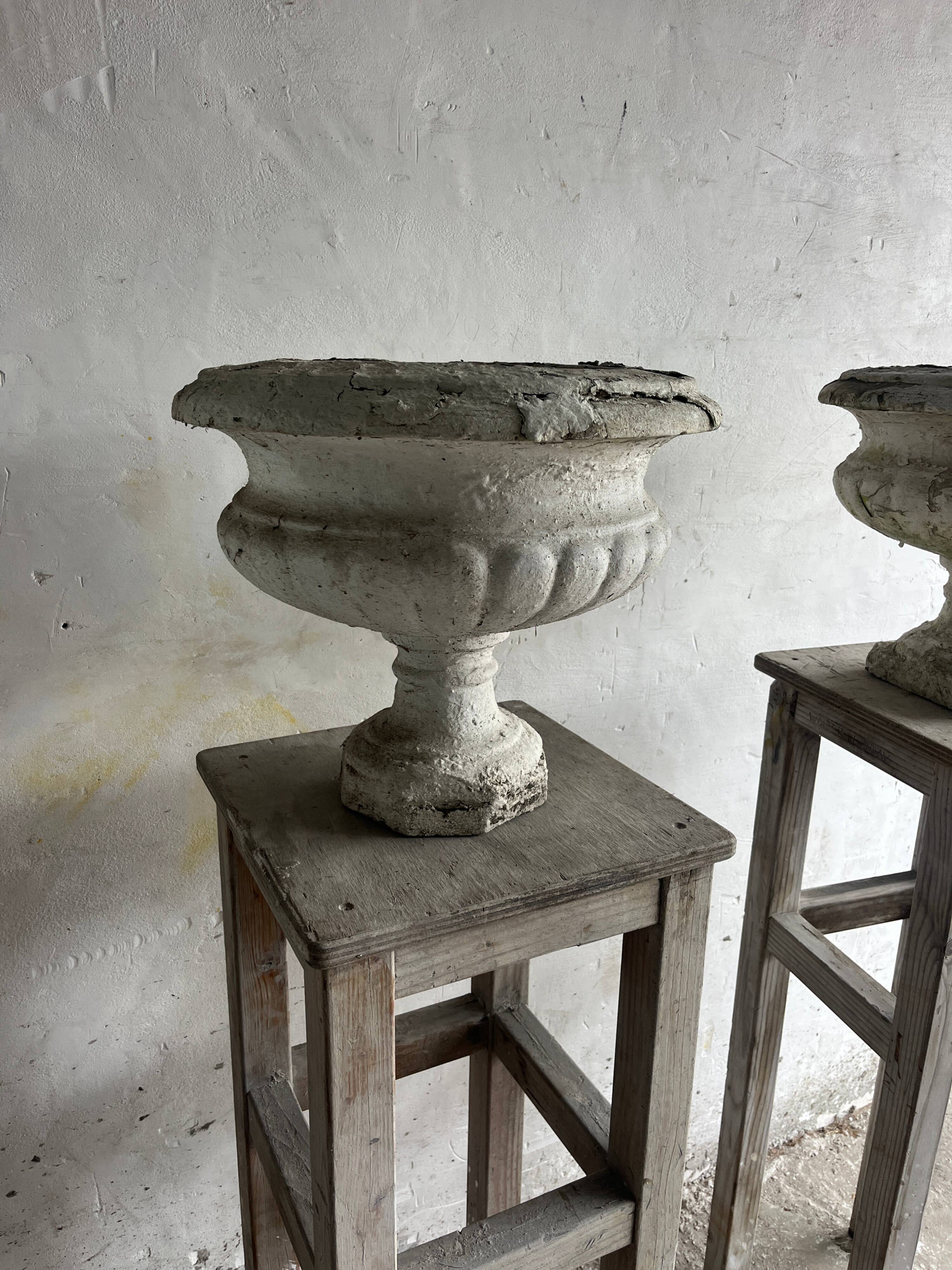 Pair of antique Médicis garden vases in cast stone.