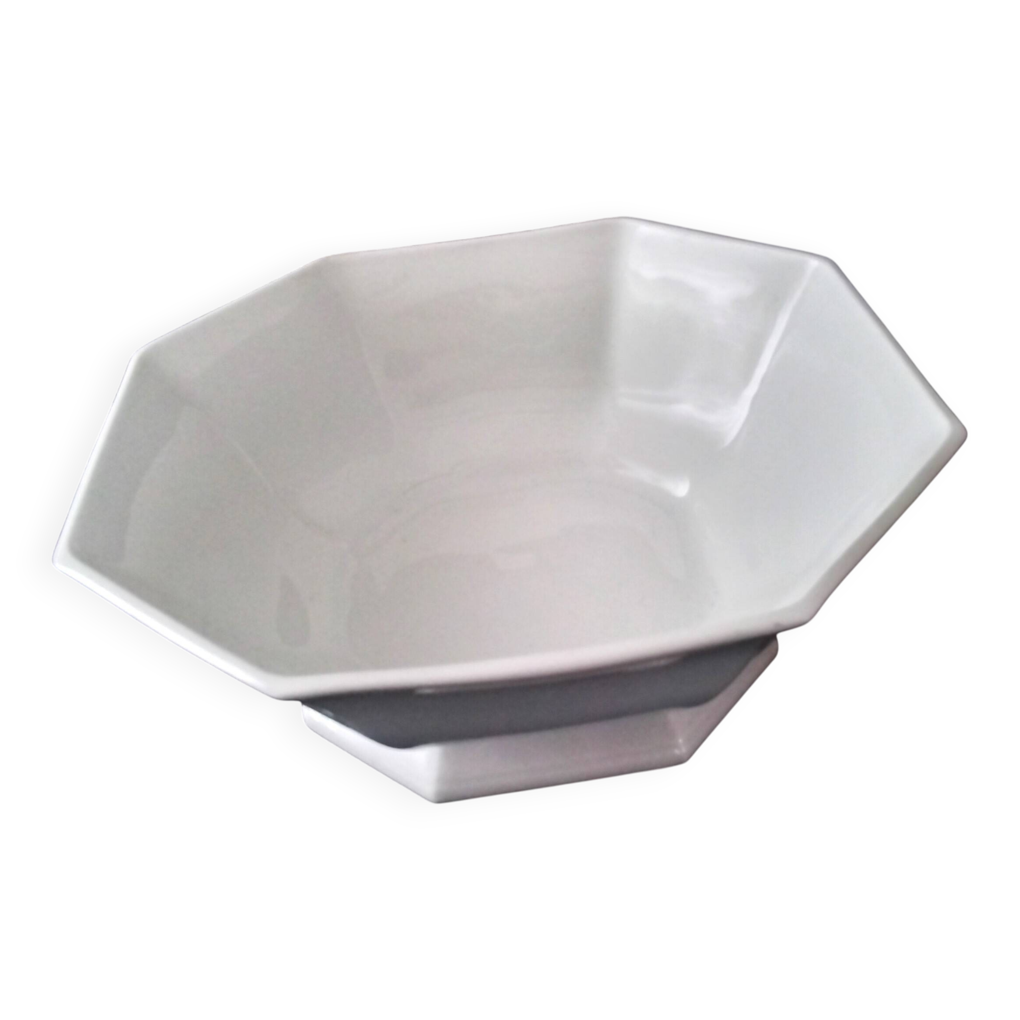 Octagonal salad bowl in white Limoges porcelain.