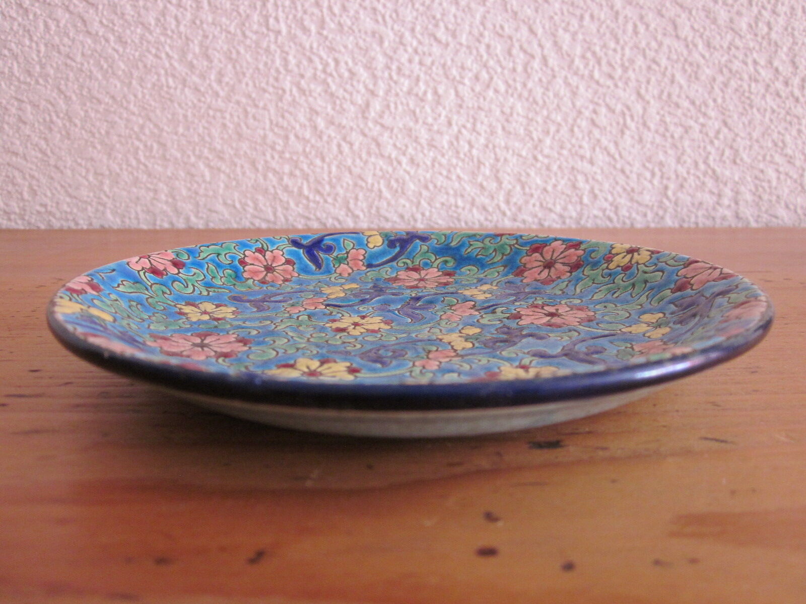 Saucer in enamels of Longwy
