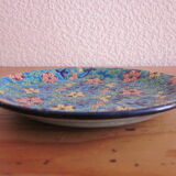 Saucer in enamels of Longwy