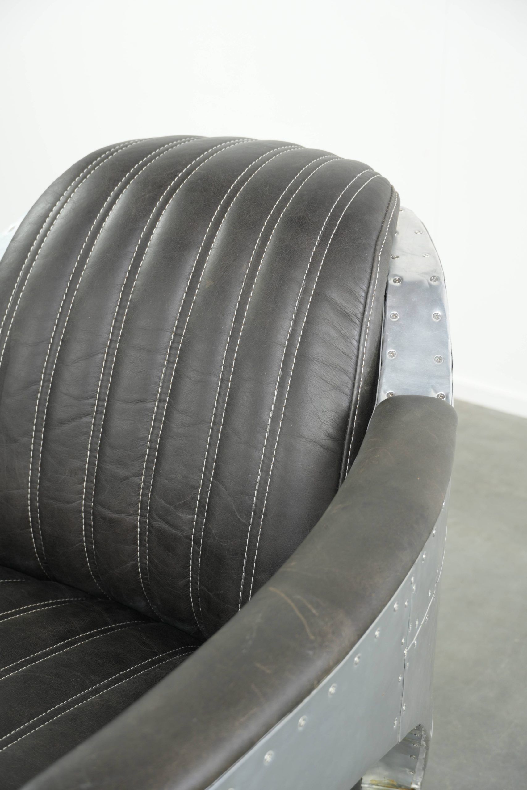 Comfortable cow leather aviator design armchair finished with aluminium