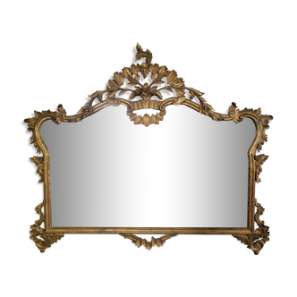 Miroir chippendale en bois sculpté et doré