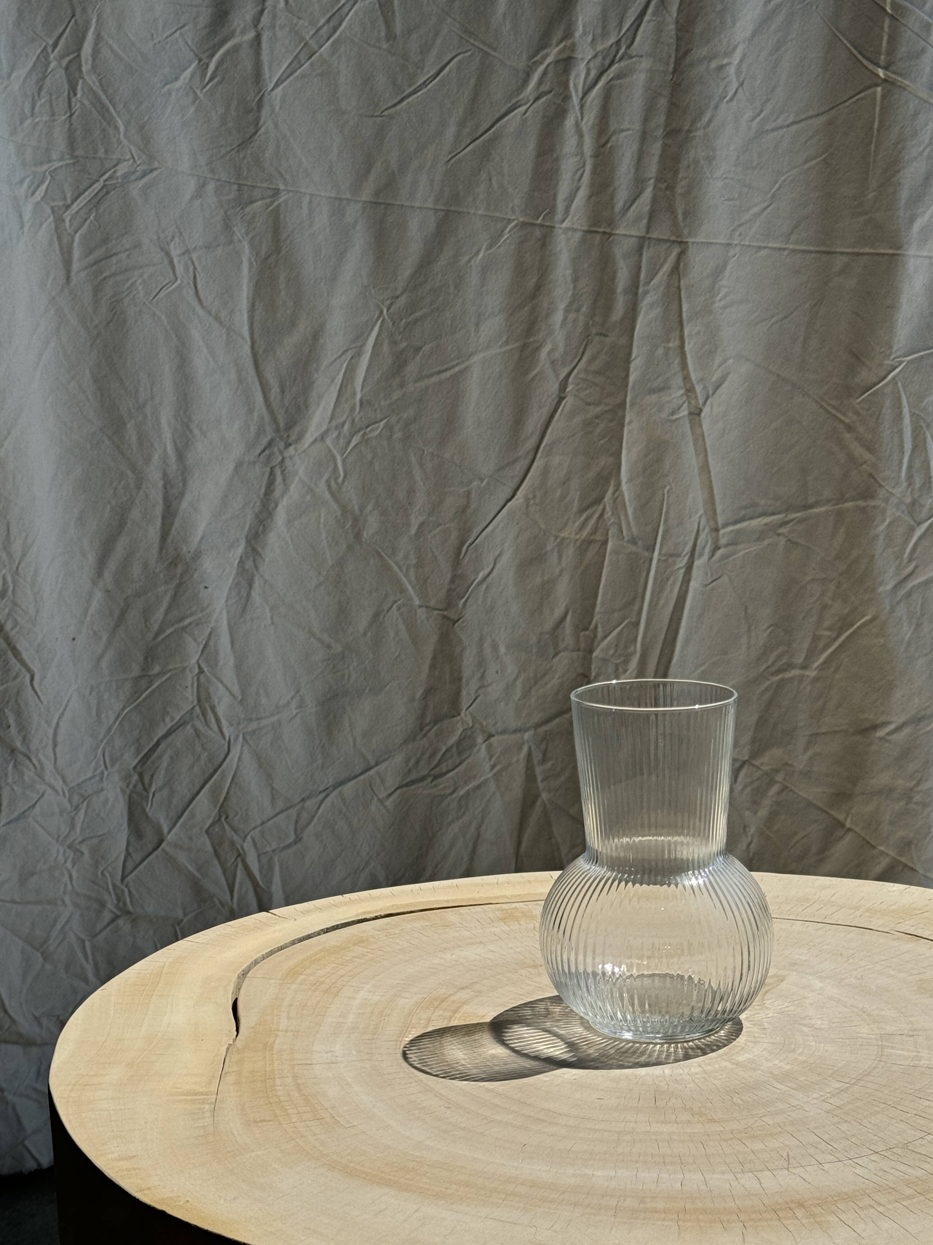 Ribbed glass ball vase