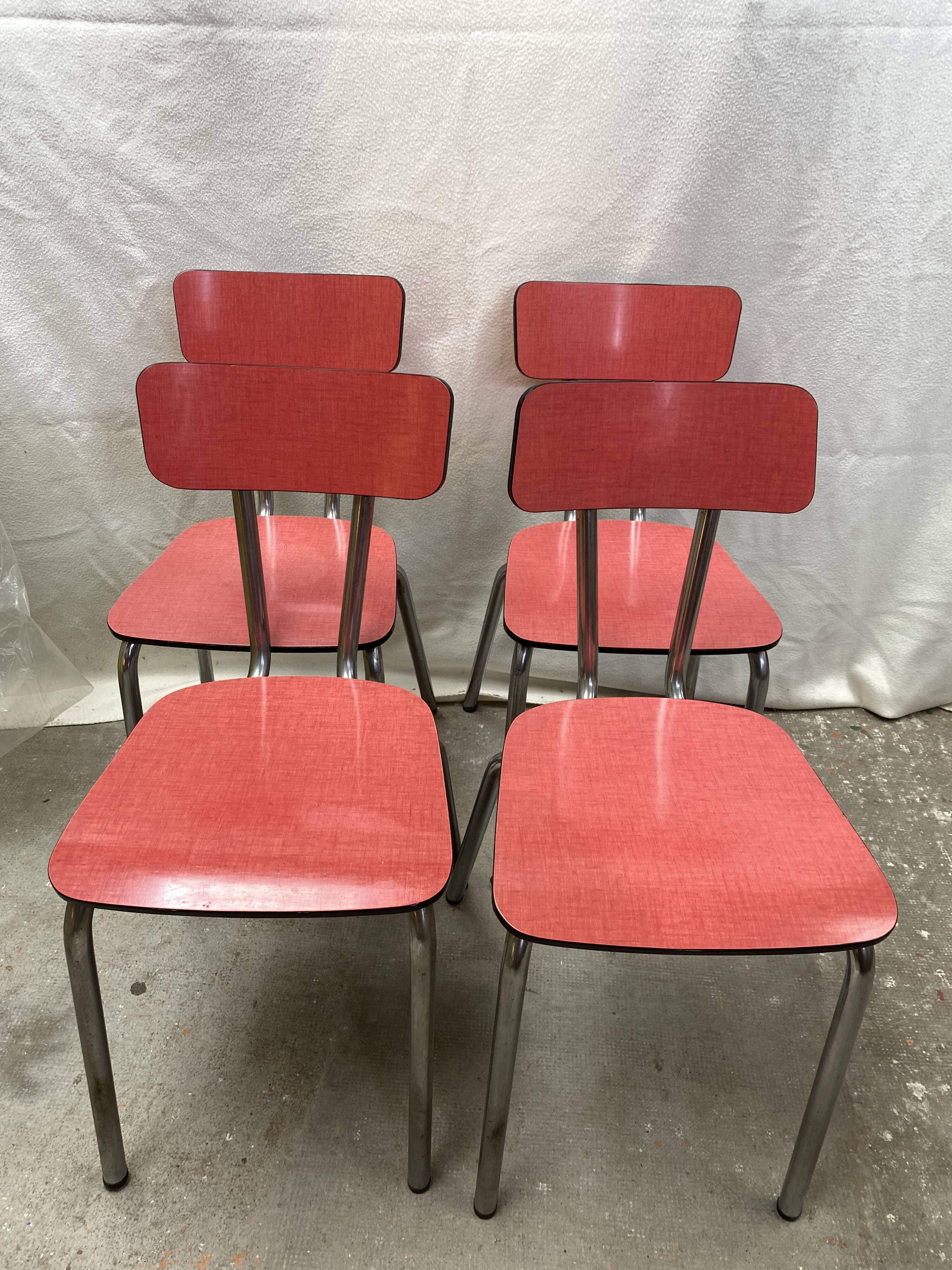 Suite of 4 red formica chairs