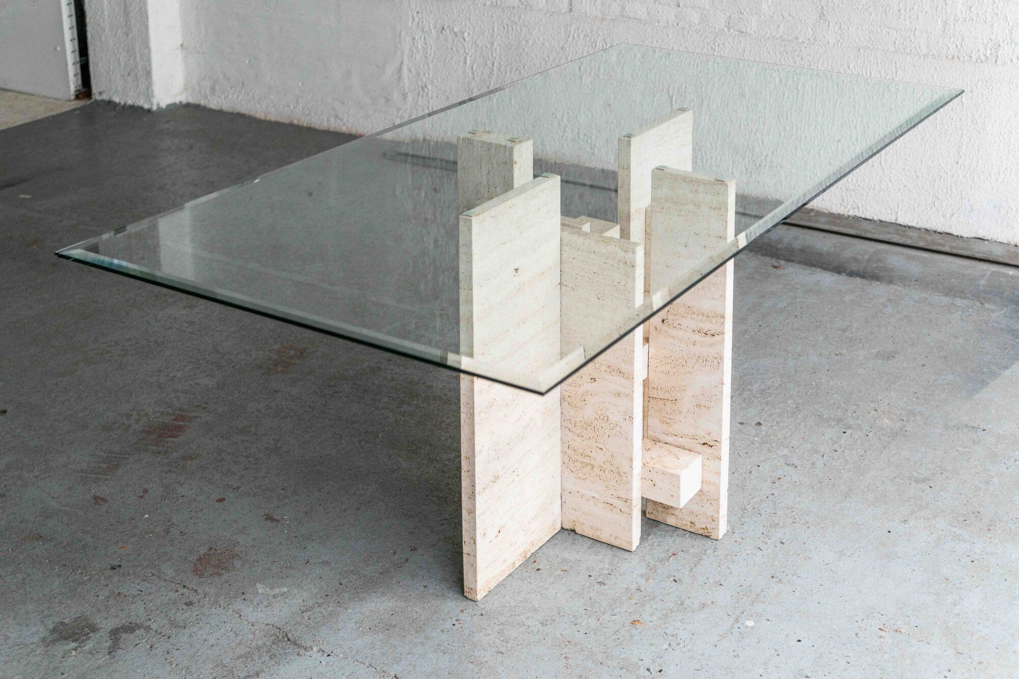 Glass & travertine dining table by Willy Ballez