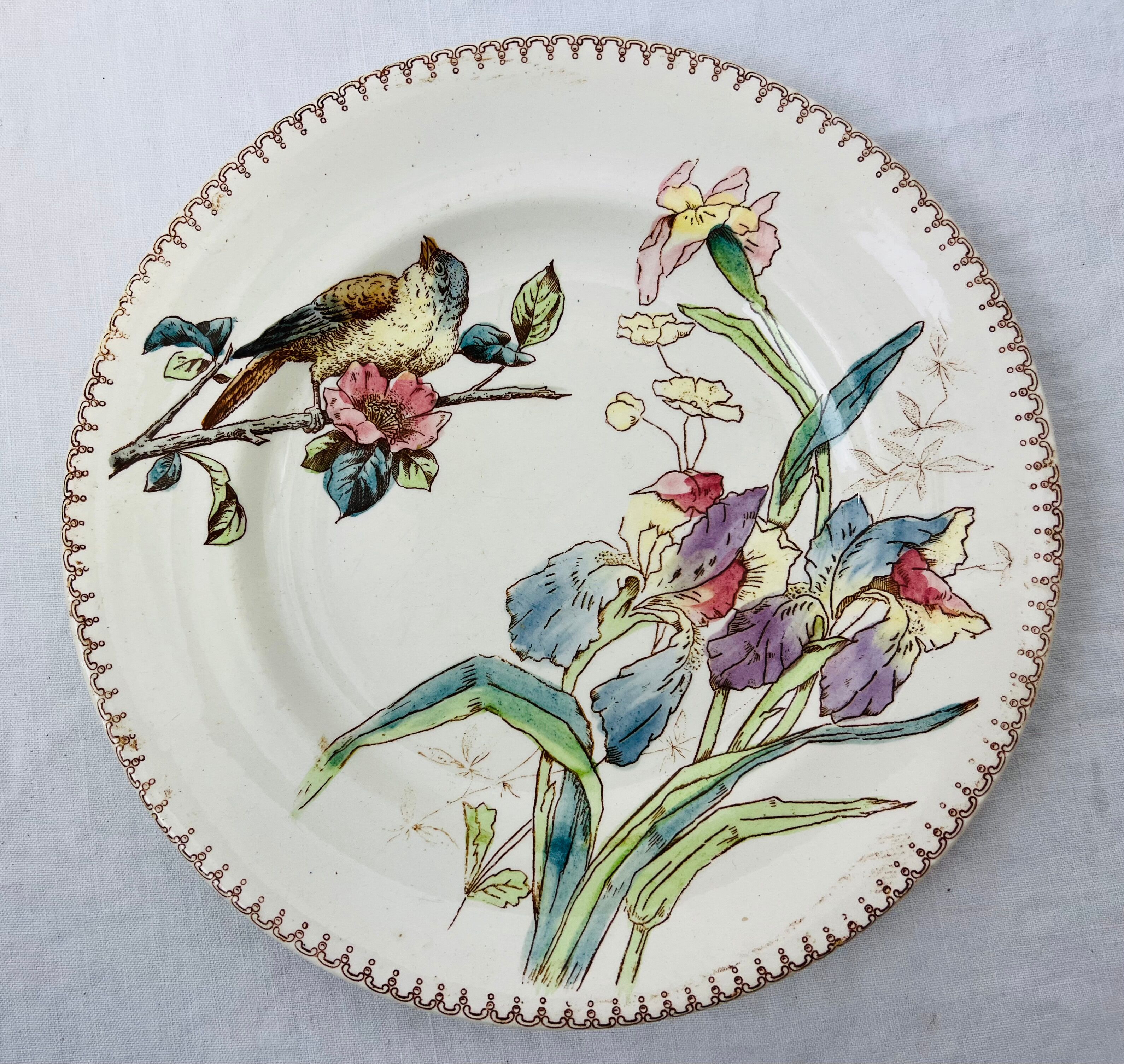 2 Art Nouveau polychrome plates signed Longwy Oiseau and Iris