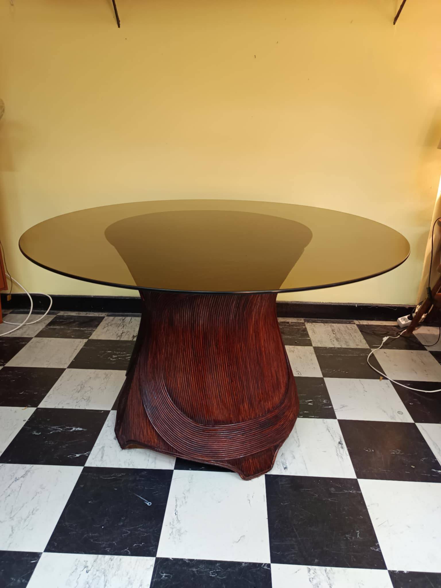 Dining table with rattan marquetry