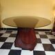 Dining table with rattan marquetry