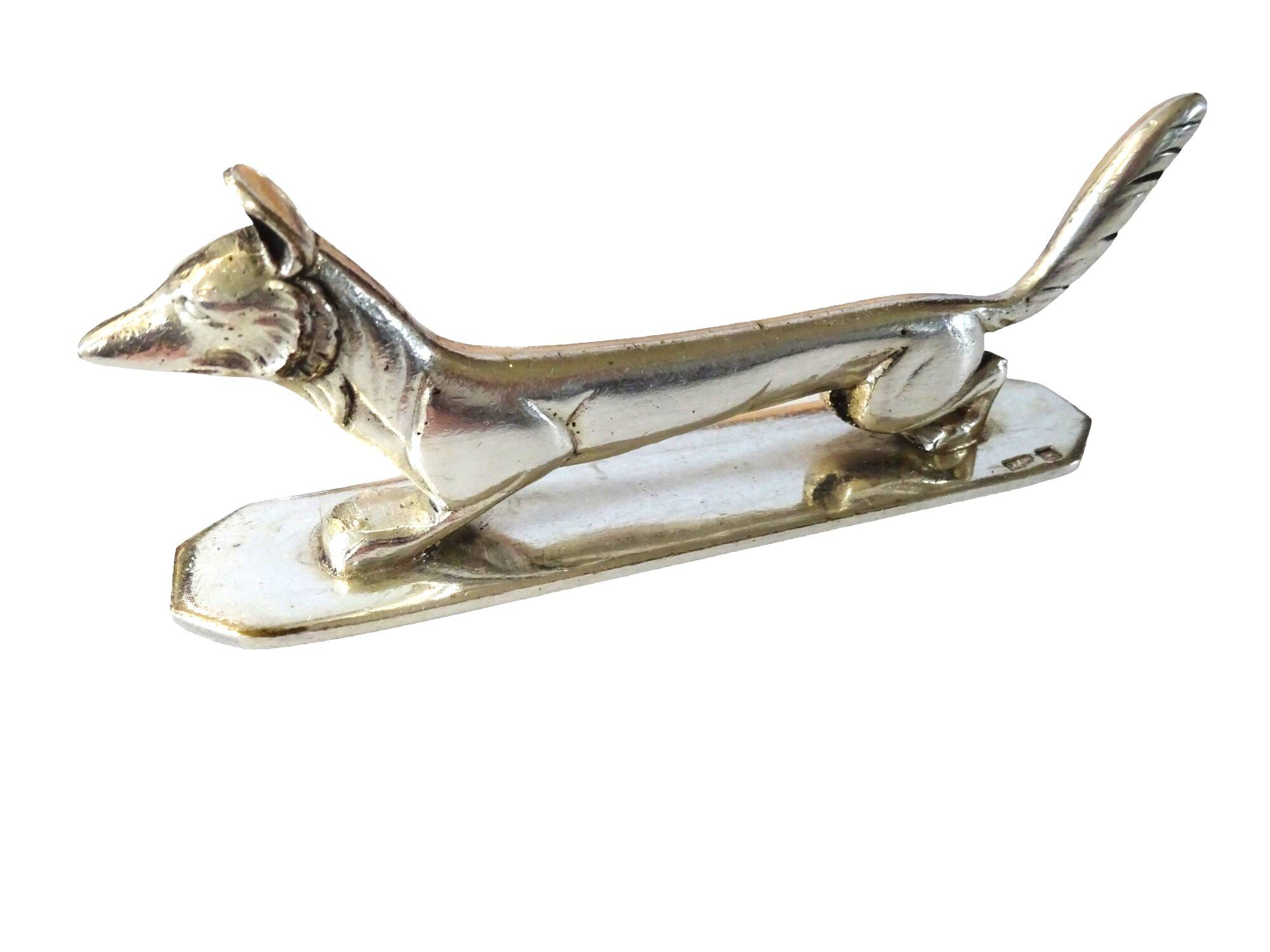 12 Art Deco animal knife holders in silvered bronze