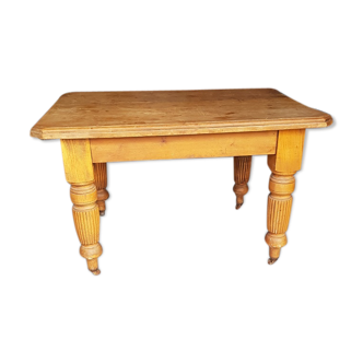 20th century renaissance style pinewood table on iron wheels