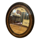 Miroir ovale vintage orné avec cadre en bois sculpté ; bronze/or en patine.