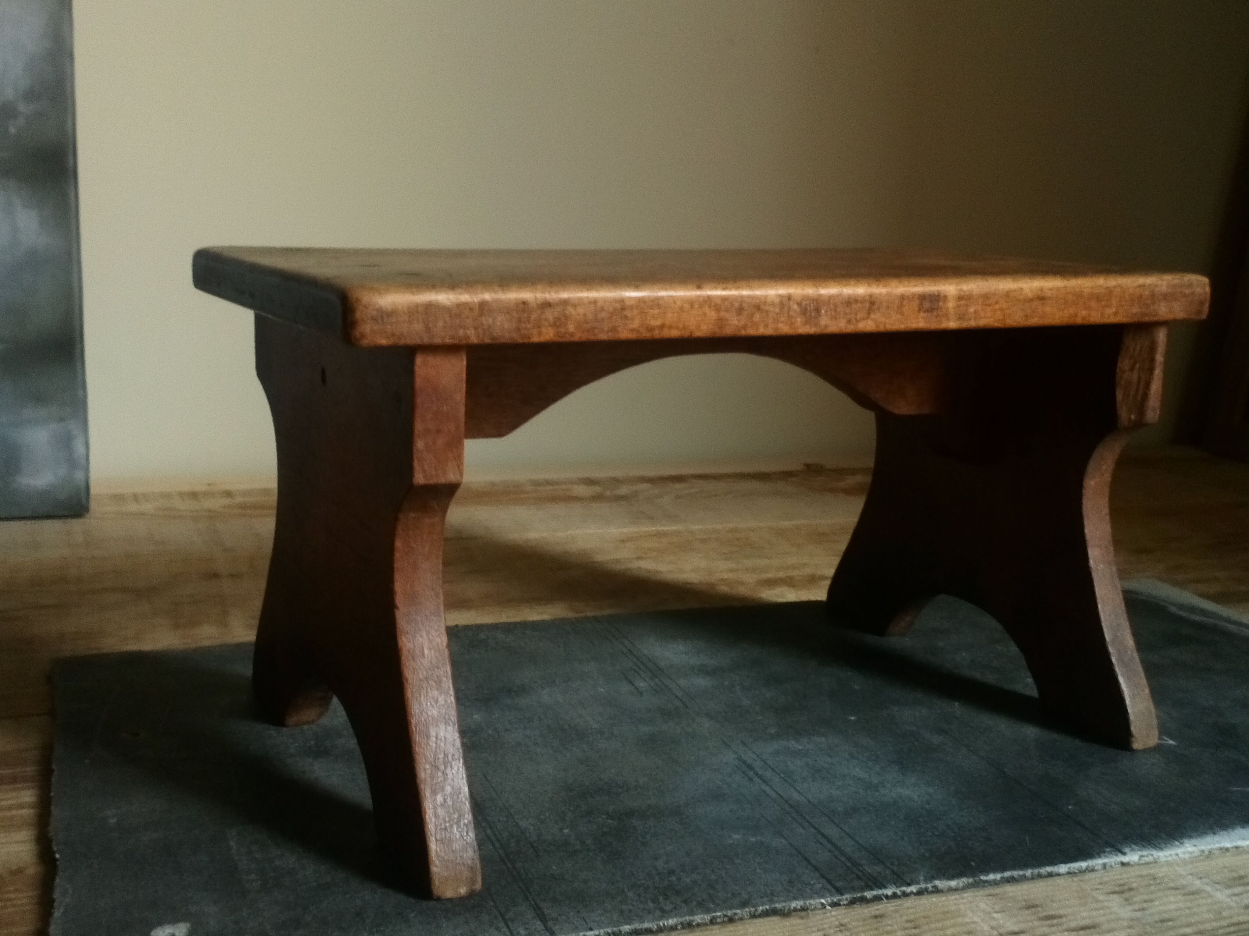 Old solid wood footring bench