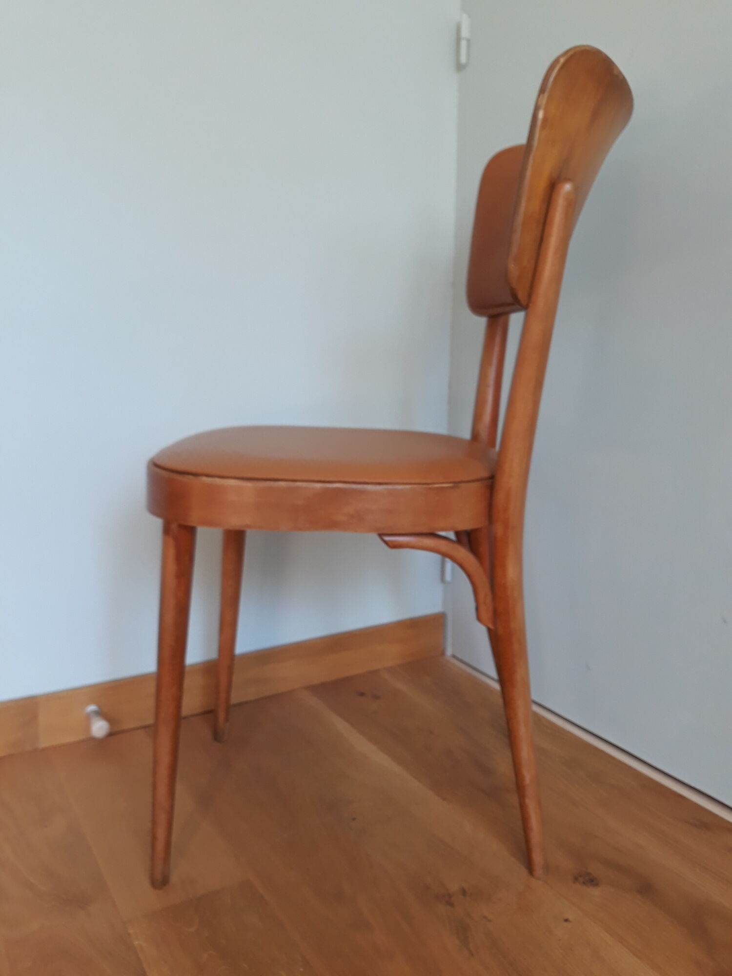 Bistro chair Baumann 1963 curved wood and skaï imitation leather caramel