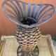 Wicker and metal vase
