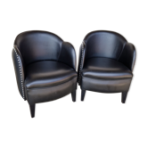 Pair of faux leather armchairs