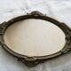 Ancien miroir face à main en bronze doré