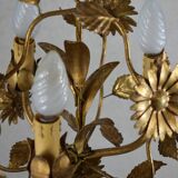 golden chandeliers with flowers.