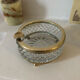 Crystal ashtray and brass