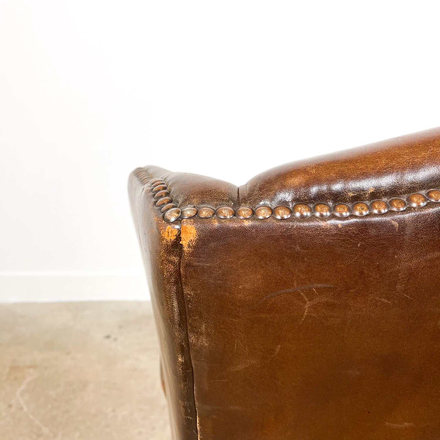 Dark brown sheep leather wingback armchair vintage
