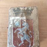 Wooden box decorated badge and unicorn