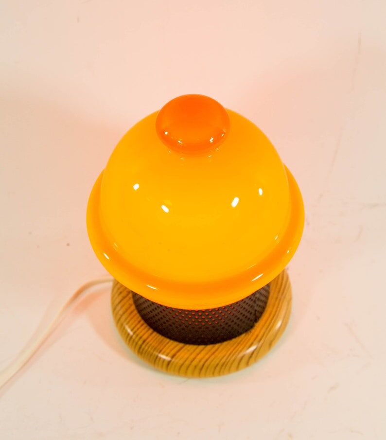 Vintage table lamp in orange glass and black perforated metal 70s