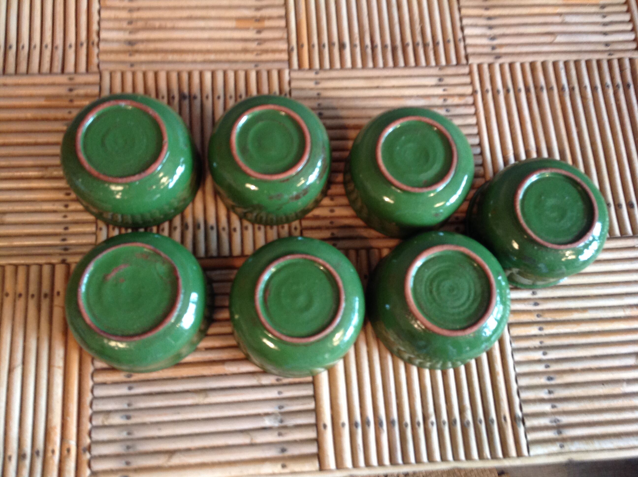 Set of 7 glazed terracotta cups
