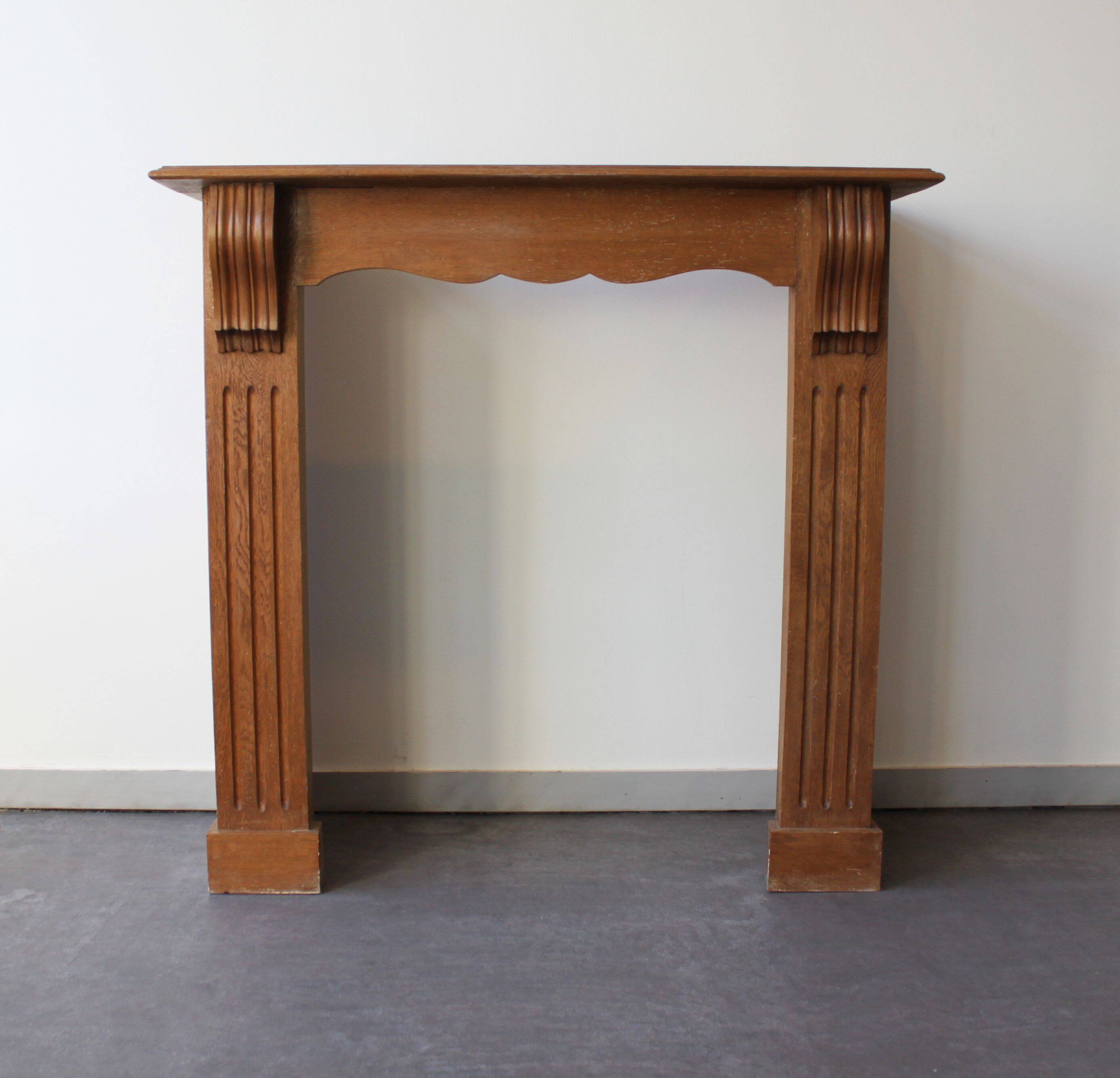 Oak fireplace mantel, Empire style.