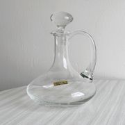 Carafe ancienne en verre soufflé à la bouche
