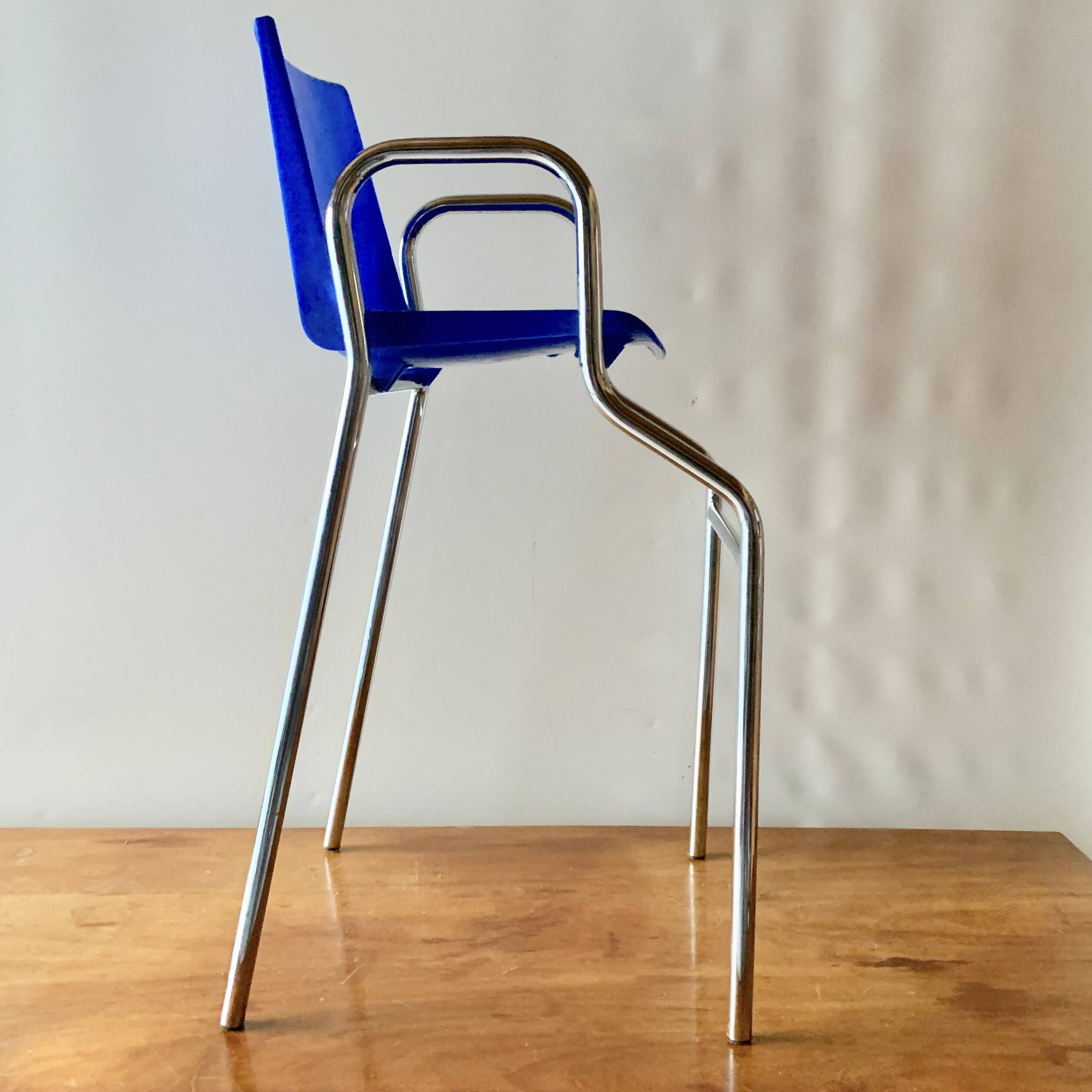 Vintage high chair for children in chrome metal and blue plastic