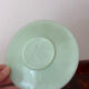 Ancienne tasse et sa soucoupe en opaline vert menthe