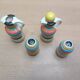 Vinegar and oil set, salt shaker and pepper shaker.