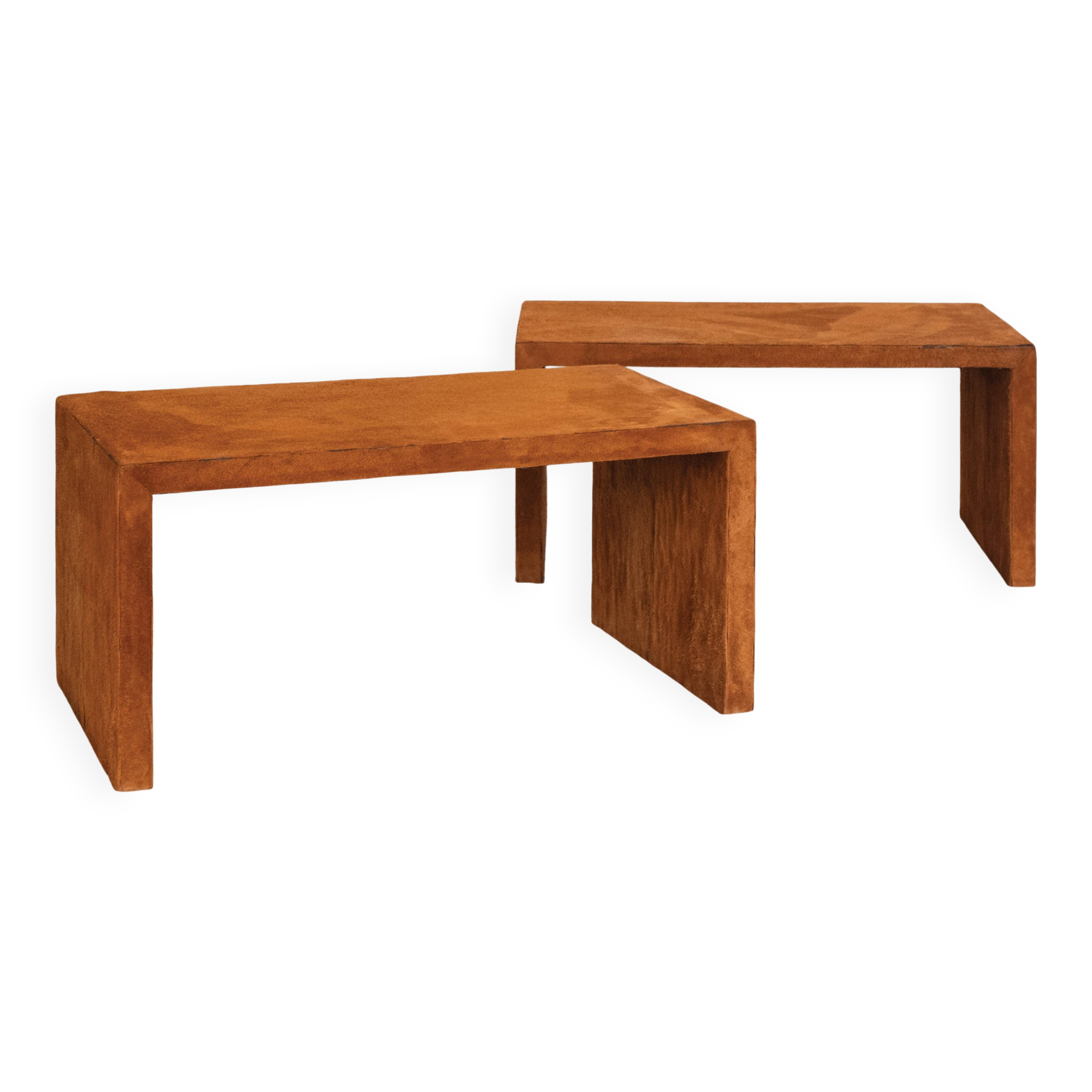 Pair of cognac suede side tables in the style of Jean Michel Frank.
