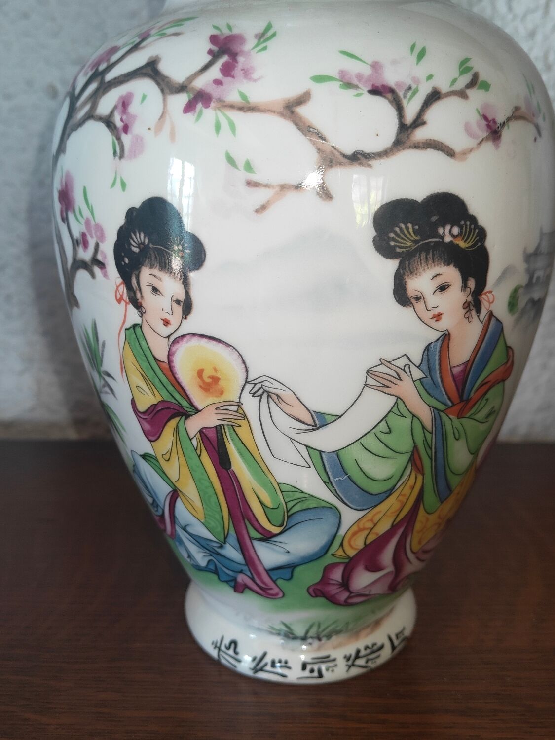 Japanese porcelain vase decorated with 2 geishas and flowering trees