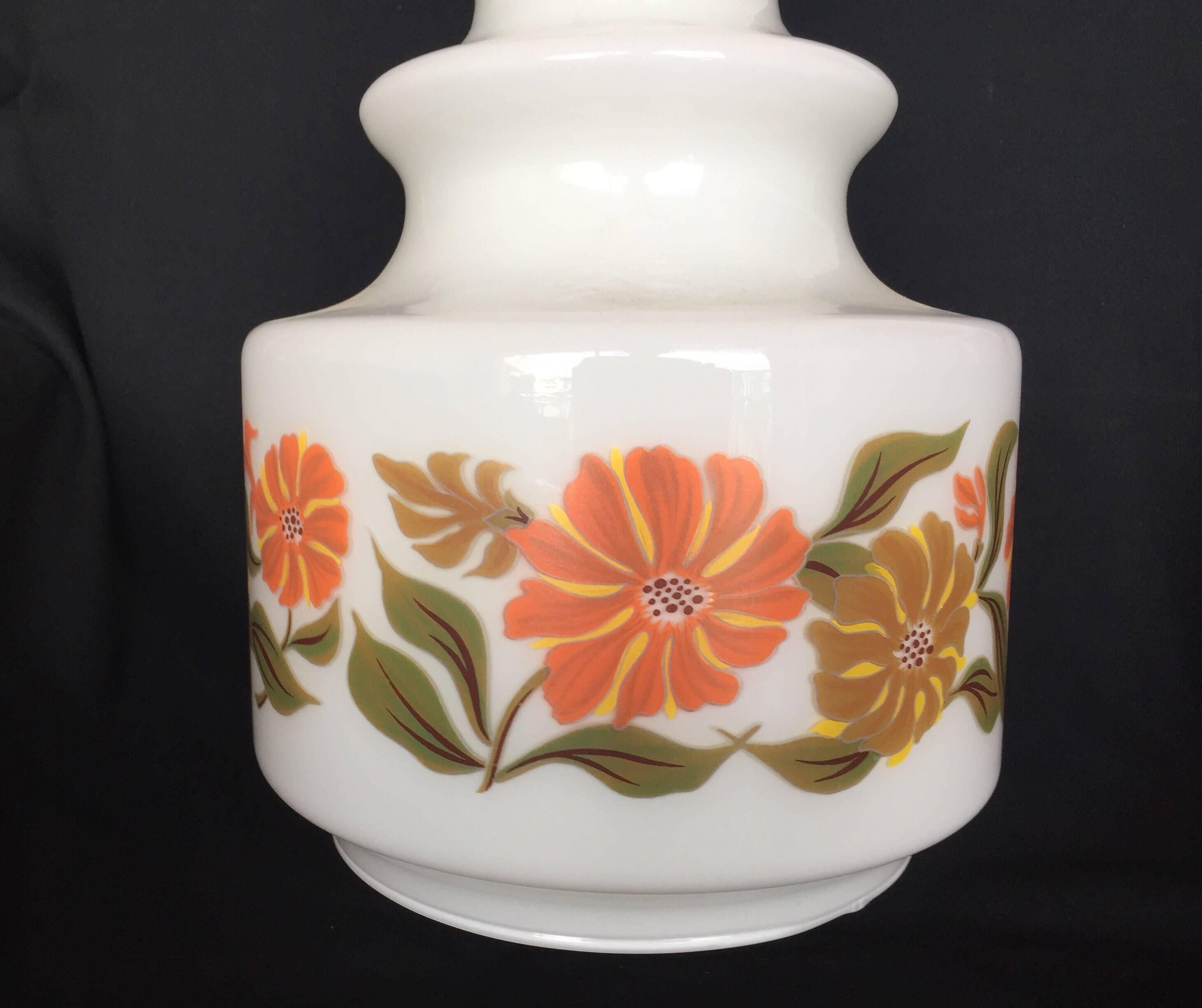 White globe and orange saucers stacked seventies pop