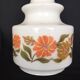 White globe and orange saucers stacked seventies pop