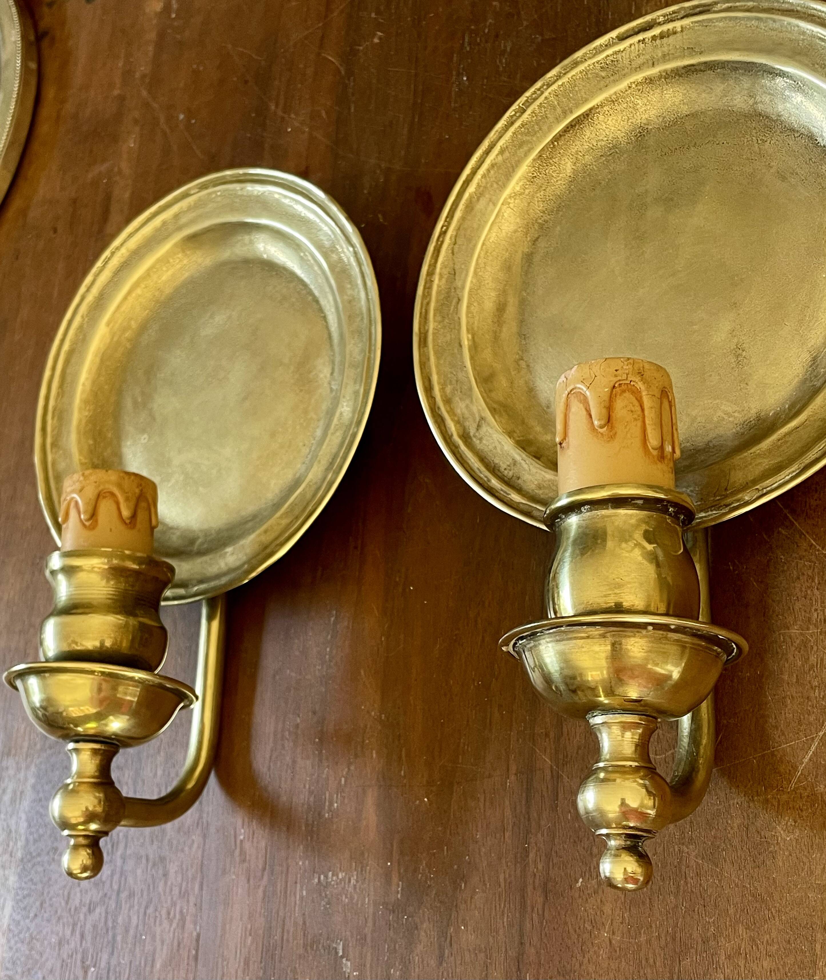 Pair of vintage wall sconces in textured brass, brutalist style.