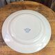 Plat rond en terre de fer