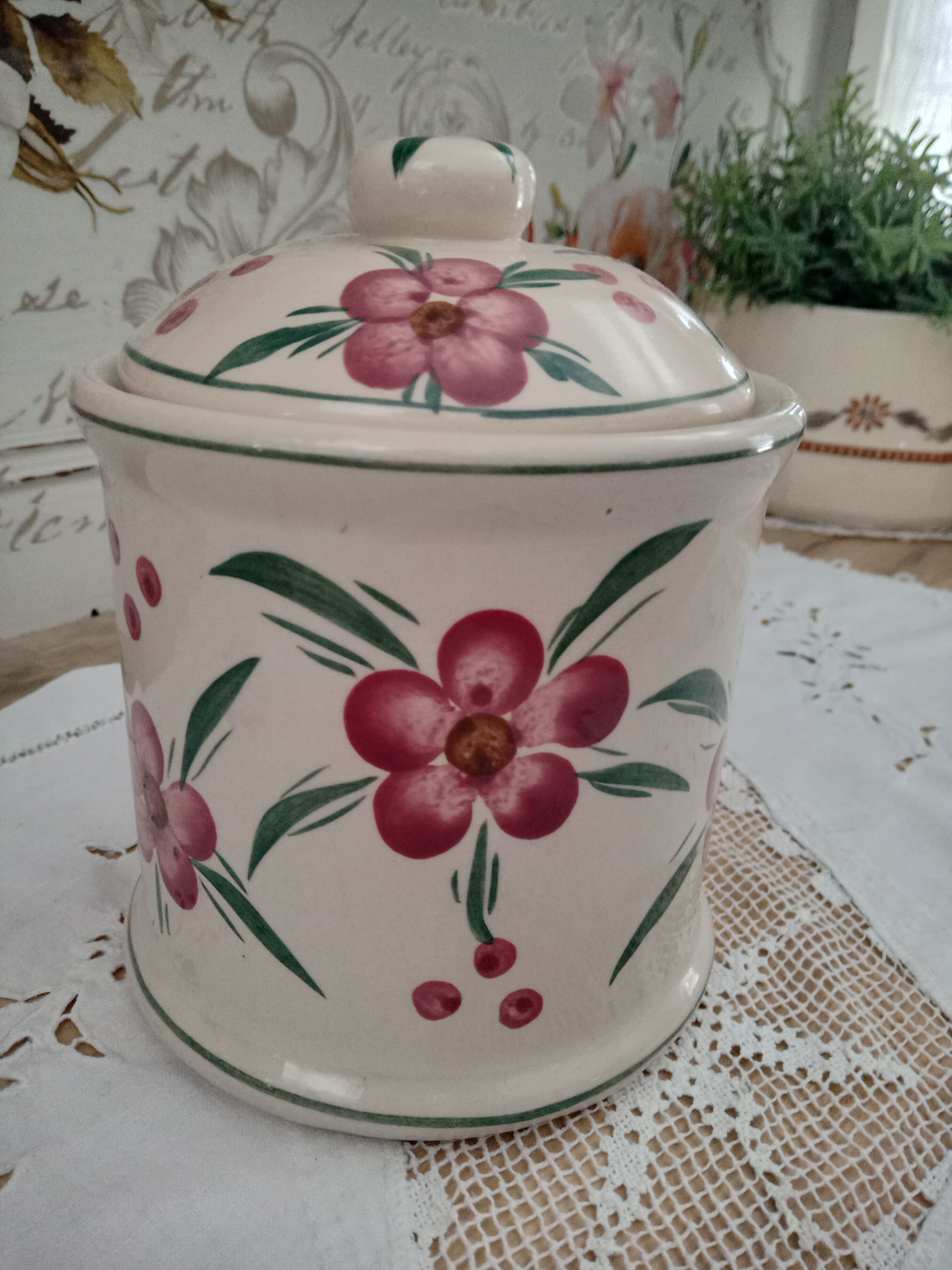 Vintage beige ceramic lid jar decorating pink flowers