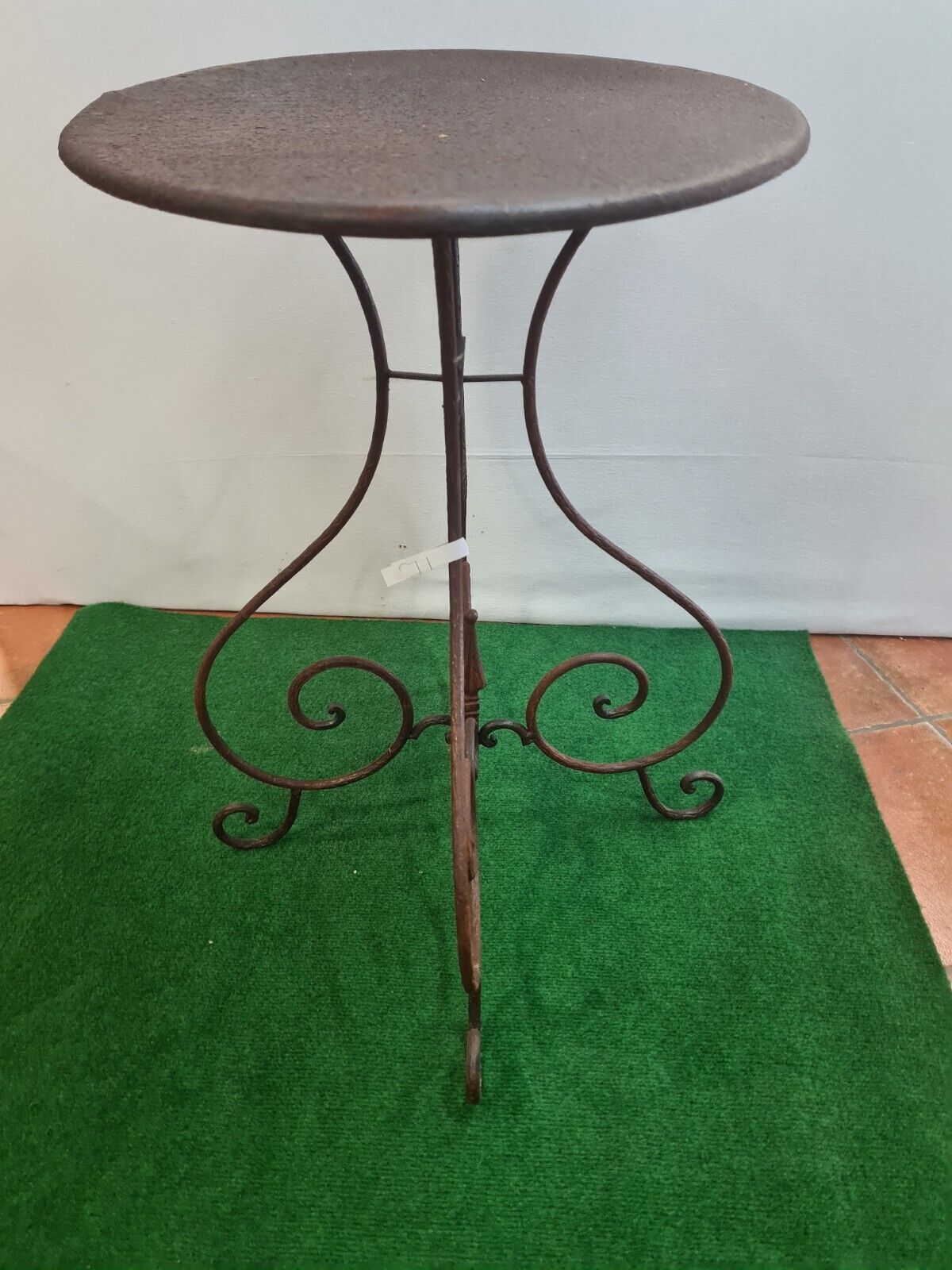 Wrought iron pedestal table