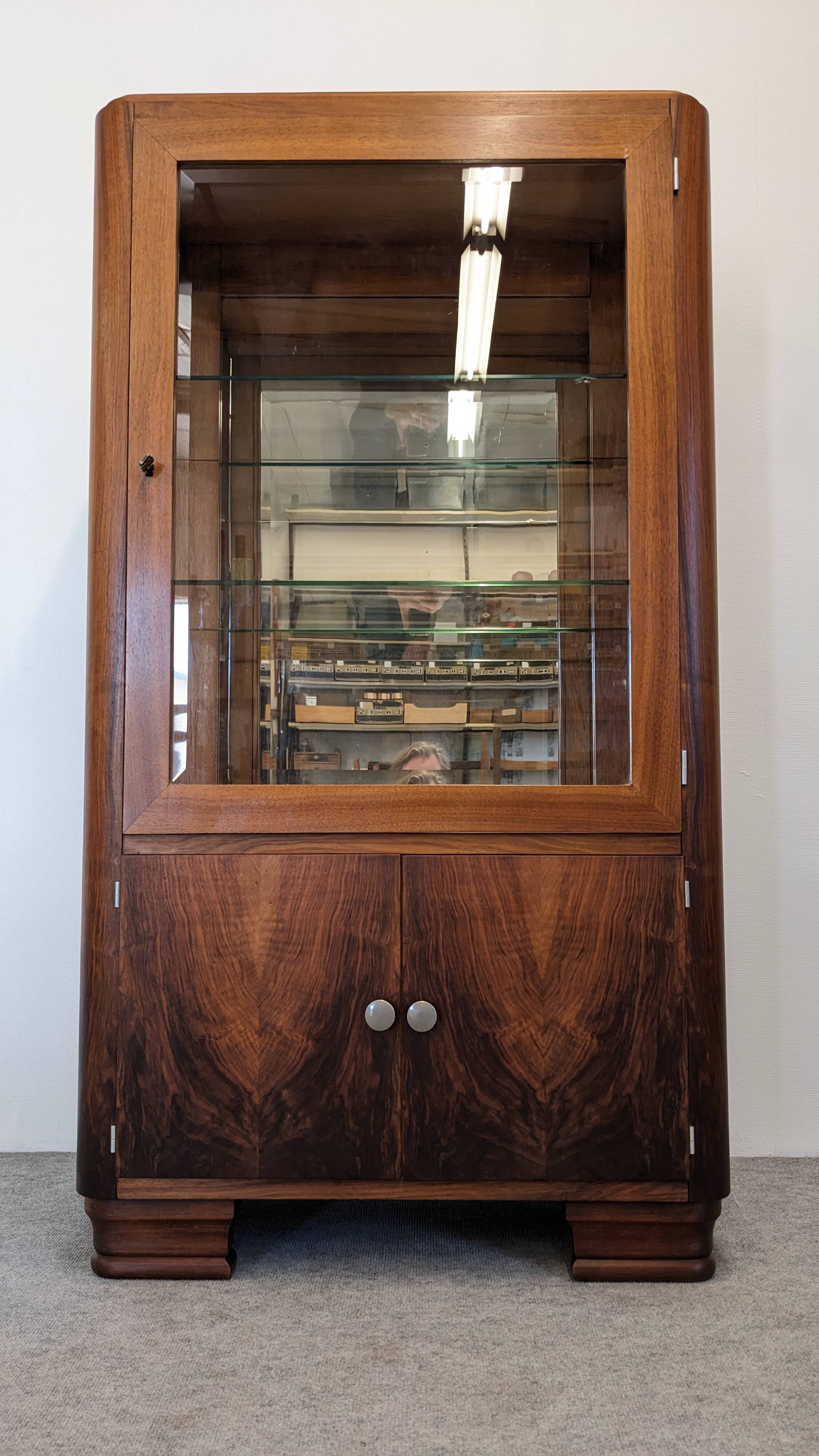 Art Deco walnut burl display cabinet, France circa 1930.