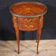 Pair of oval bedside tables in marquetry from the 20th century.