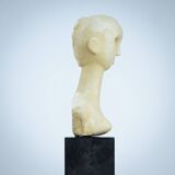 Modernist bust sculpture of a woman in sandstone