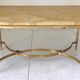 Table basse marbre et métal doré