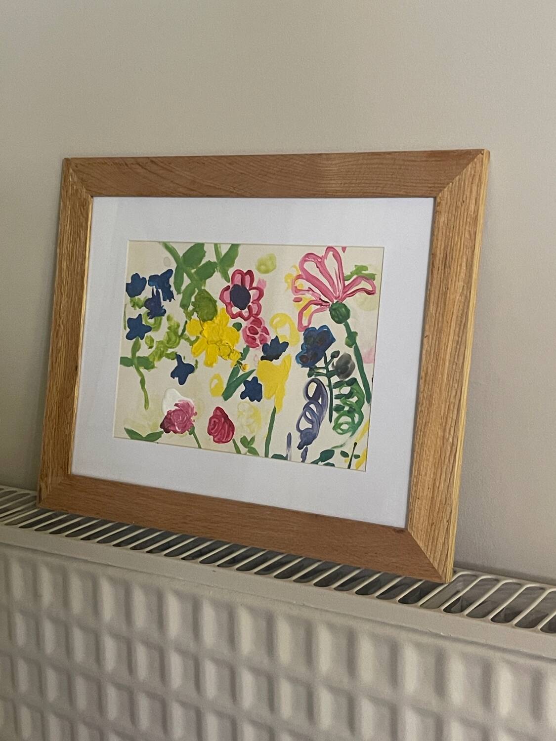 Flower painting in an antique frame