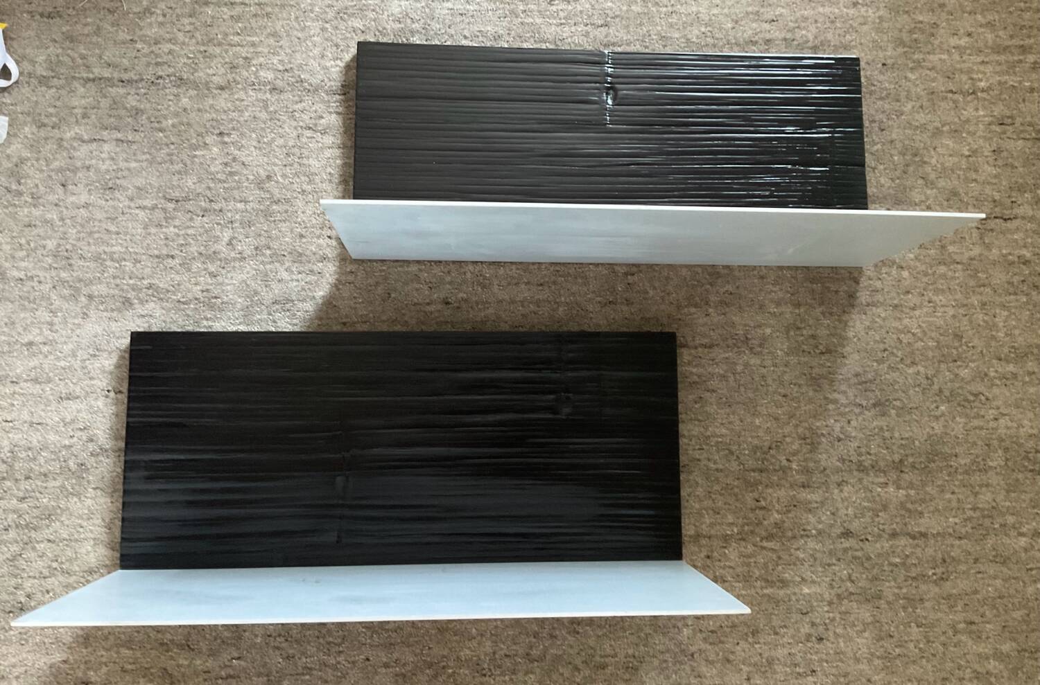 Pair of contemporary shelves in steel and stained wood