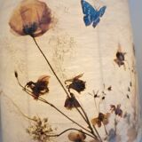 Lampe à poser en verre et abat jour en fleurs séchées.