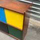 Closed bookcase in Bauhaus colors by D.Rozaffy Edition Meuble Oscar, design 1960
